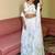 White Georgette Hand-Painted Floral Lehenga with Kodi Work Blouse and Matching Dupatta
