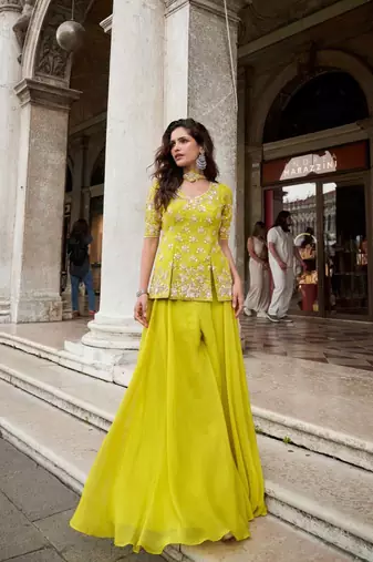 Lime yellow organza peplum palazzo suit with zari sequins bead and thread work free-size stitched.