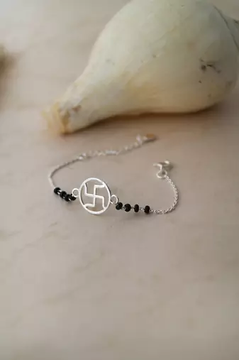 Rhodium-plated swastik black beads nazariya bracelet