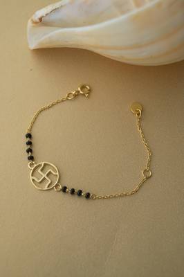 Gold-plated swastik black beads nazariya bracelet 1