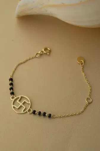 Gold-plated swastik black beads nazariya bracelet
