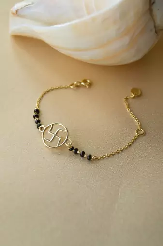 Gold-plated swastik black beads nazariya bracelet