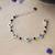 Rhodium-plated evil eye black beads nazariya bracelet