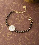 Gold-plated om black beads nazariya bracelet