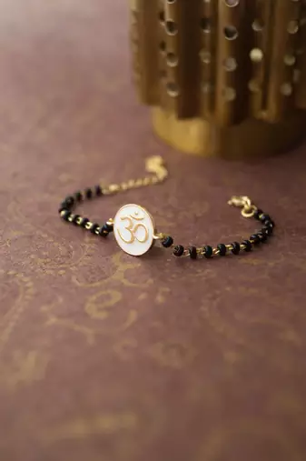 Gold-plated om black beads nazariya bracelet