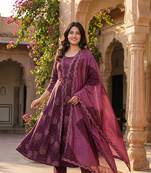 purple anarkali kurta set with pants and a dupatta.