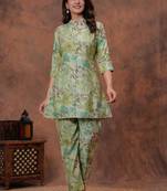 A green digital flower printed muslin party wear coord sets