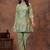 A green digital flower printed muslin party wear coord sets