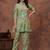 A green digital flower printed muslin party wear coord sets