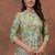 A green digital flower printed muslin party wear coord sets
