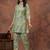 A green digital flower printed muslin party wear coord sets