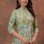 A green digital flower printed muslin party wear coord sets