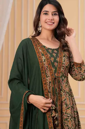 green printed anarkali kurta set with a matching dupatta and pants.