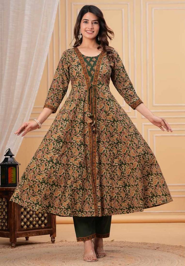 green printed anarkali kurta set with a matching dupatta and pants.