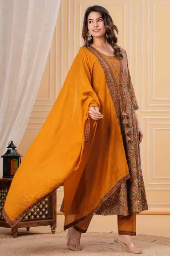 mustard yellow paisley printed anarkali kurta set with trousers and a dupatta