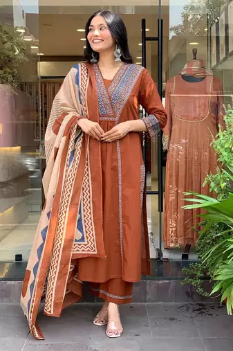 rust orange cotton kurta set with a block-printed dupatta and pants,