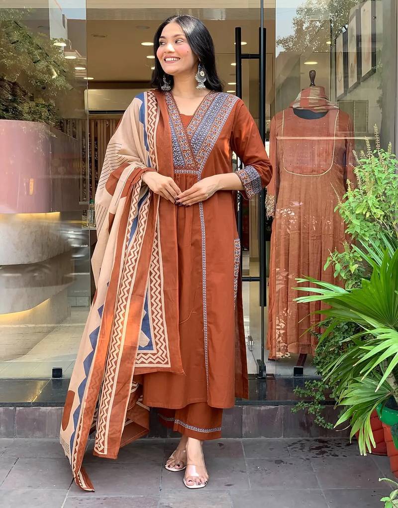 rust orange cotton kurta set with a block-printed dupatta and pants,