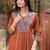 rust orange cotton kurta set with a block-printed dupatta and pants,