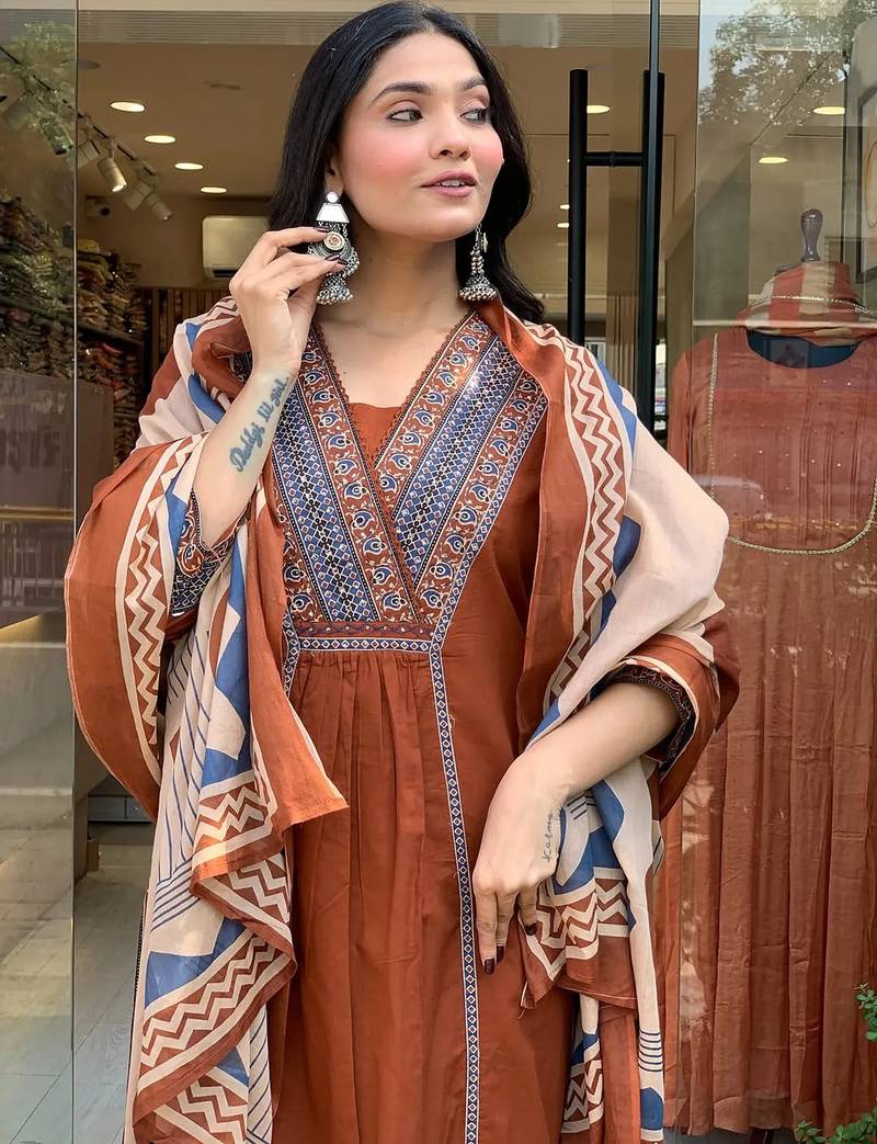 rust orange cotton kurta set with a block-printed dupatta and pants,