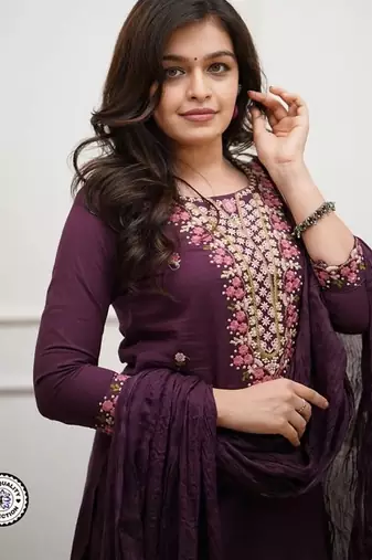 purple embroidered salwar kameez set with a dupatta