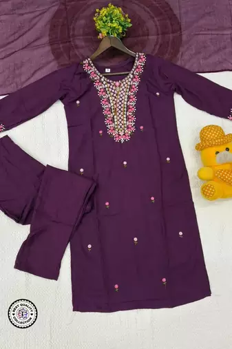 purple embroidered salwar kameez set with a dupatta