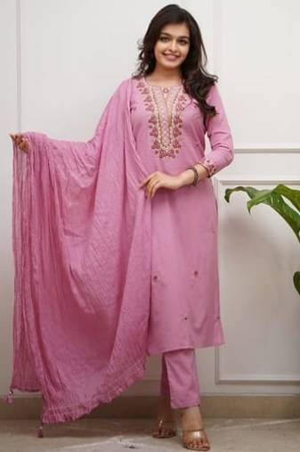 pink embroidered kurti pant dupatta set.