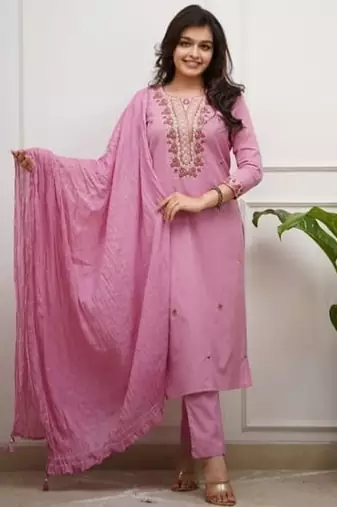 pink embroidered kurti pant dupatta set.