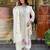 white linen floral embroidered kurta set.