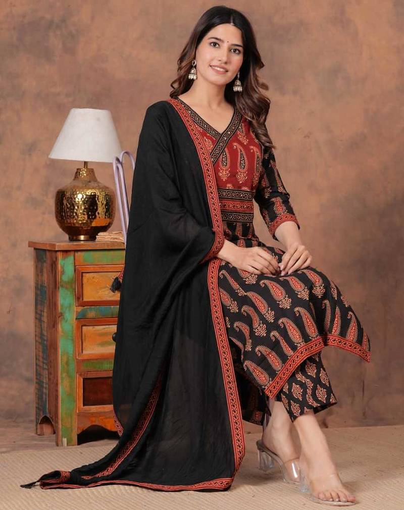black and red paisley printed kurti set with a dupatta.
