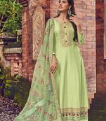 Green embroidery zari art silk anarkali churidar suit- free size stitched(size upto 42")
