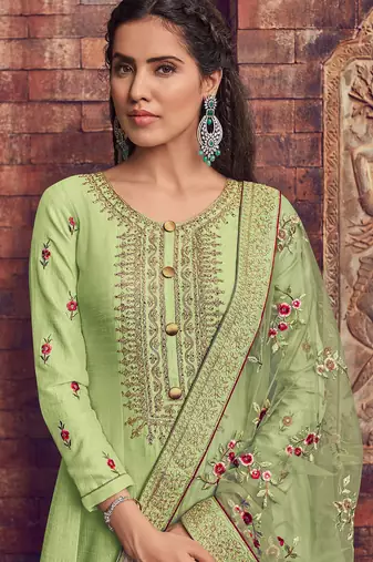 Green embroidery zari art silk anarkali churidar suit- free size stitched(size upto 42")