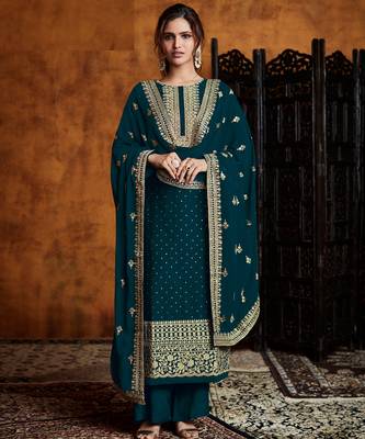 Teal green georgette palazzo suit with embroidery and sequins work free-size stitched. 1