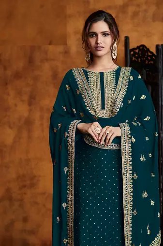 Teal green georgette palazzo suit with embroidery and sequins work free-size stitched.