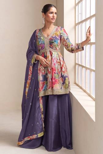 Multi-color chinon silk straight top palazzo suit with zari, stone, sequin and print work, free-size stitched.