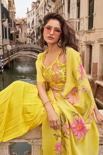 Yellow chinon silk blouse palazzo suit with embroidered mirror hand and sequin work free-size stitched.