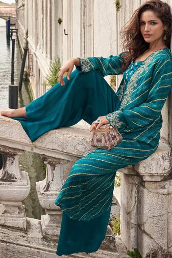 Teal blue chinon silk blouse palazzo suit with hand, mirror, embellished and sequin work, free-size stitched.