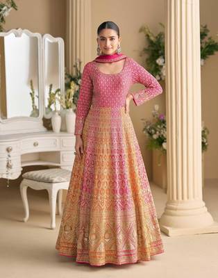 Rani pink georgette anarkali gown pant suit with heavy thread zari and sequins work free-size stitched. 1