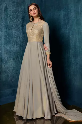 Grey satin gown suit with embroidery and sequins work free-size stitched.