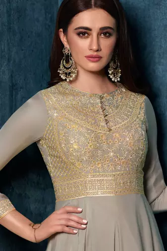 Grey satin gown suit with embroidery and sequins work free-size stitched.