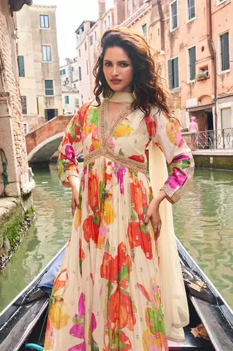 Cream chinon silk anarkali gown suit with intricate zari and sequins embroidery free-size stitched.