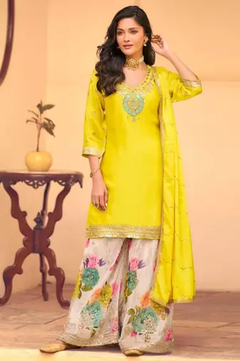 Yellow chinon silk straight top palazzo suit with embroidery and stone sequin work free-size stitched.