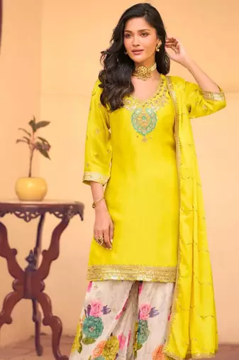 Yellow chinon silk straight top palazzo suit with embroidery and stone sequin work free-size stitched.