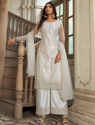 White net straight palazzo suit with zari embroidery and sequins work, free-size stitched (up to 42"). 1