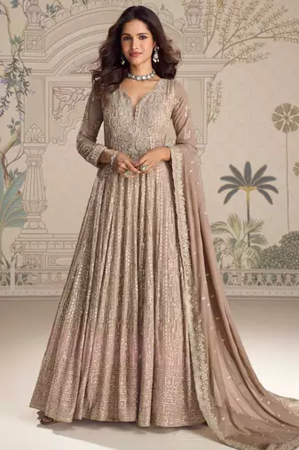 Beige georgette anarkali gown suit with heavy embroidery, sequins, thread, seroski & zarkan, free-size stitched.