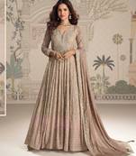 Beige georgette anarkali gown suit with heavy embroidery, sequins, thread, seroski & zarkan, free-size stitched.