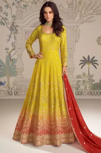 Yellow georgette anarkali gown suit with heavy embroidery, sequins, thread, seroski & zarkan, free-size stitched.