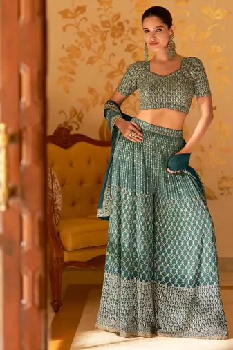 Teal green georgette blouse palazzo suit with sequin, zari weaving & shimmer embroidery, free-size stitched.