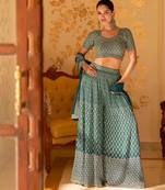 Teal green georgette blouse palazzo suit with sequin zari weaving & shimmer embroidery - Full Stitched free Size