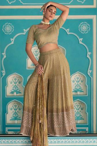 Gold georgette blouse palazzo suit with sequin, zari weaving & shimmer embroidery, free-size stitched.