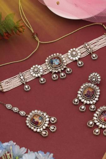 Vibrant multi color choker kundan necklace set designed to enhance every traditional look